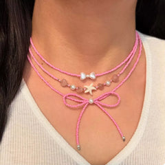 Beaded Three-Layered Necklace with Bow and Starfish Charms