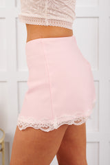 Rosy Rhythm Lace Hemline Mini Skirt (Light Pink)